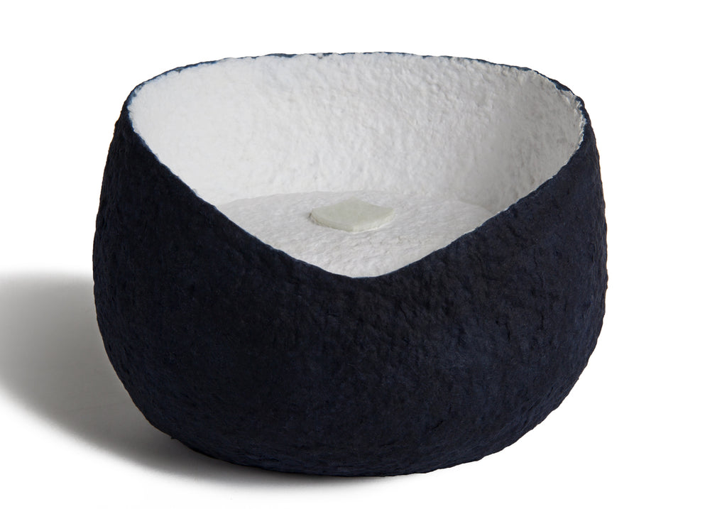 Picture of a white and blue ovoid shaped biodegradable cremation urn for pets on sale at Muses Design Urns. Front view.