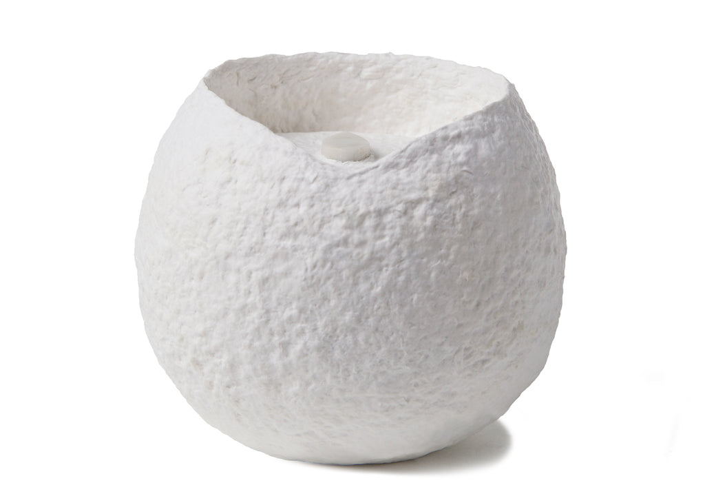 Picture of a white round shape biodegrdable coton fibre cremation urn for children on sale at Muses Design Urns. Front view.